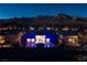 Stunning aerial view of the home and community with majestic mountain backdrop at twilight at 794 Willits St, Las Vegas, NV 89138