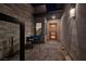 Inviting courtyard with contemporary furniture and a stylish front door with glass panels at 794 Willits St, Las Vegas, NV 89138