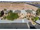 Aerial view of condo complex featuring ample parking and desert landscape at 8070 W Russell Rd # 1023, Las Vegas, NV 89113