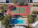 Aerial of community amenities include a tennis court, swimming pool, and mature landscaping at 8070 W Russell Rd # 1023, Las Vegas, NV 89113
