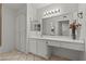 Bright bathroom with long vanity and storage at 8070 W Russell Rd # 1023, Las Vegas, NV 89113