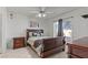 Comfortable bedroom featuring a classic wooden bed frame and ample natural light at 8070 W Russell Rd # 1023, Las Vegas, NV 89113