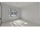 Empty bedroom with light streaming through a window at 8070 W Russell Rd # 1023, Las Vegas, NV 89113