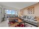 Inviting living room with plush sofas, stylish decor, and natural light at 8070 W Russell Rd # 1023, Las Vegas, NV 89113