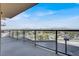 Spacious balcony with glass railings and a panoramic view of the city and mountains beyond at 8255 Las Vegas Blvd # 722, Las Vegas, NV 89123