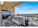 Serene outdoor balcony space with stylish furniture and scenic city views at 8255 Las Vegas Blvd # 722, Las Vegas, NV 89123