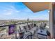 Relaxing balcony area with comfortable seating and panoramic views of the surrounding cityscape at 8255 Las Vegas Blvd # 722, Las Vegas, NV 89123