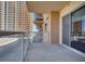 Private balcony featuring glass railings, providing a clear view of the surrounding high-rise buildings at 8255 Las Vegas Blvd # 722, Las Vegas, NV 89123