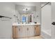 Bright bathroom featuring double sinks, a large mirror and stylish fixtures adding a touch of elegance at 8255 Las Vegas Blvd # 722, Las Vegas, NV 89123