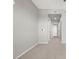 Bedroom with neutral walls, plush carpeting, and a doorway leading to additional rooms at 8255 Las Vegas Blvd # 722, Las Vegas, NV 89123