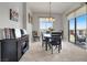Dining room with natural light and views; bedroom in background at 8255 Las Vegas Blvd # 722, Las Vegas, NV 89123