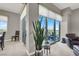 Inviting living area featuring sliding glass doors leading to a balcony with scenic views at 8255 Las Vegas Blvd # 722, Las Vegas, NV 89123