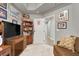Cozy office setup with a sofa, built-in shelving, and a functional workspace for a home office at 8255 Las Vegas Blvd # 722, Las Vegas, NV 89123