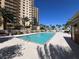 Outdoor swimming pool with clear blue water and views of the building at 8255 Las Vegas Blvd # 722, Las Vegas, NV 89123