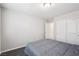 Cozy bedroom with neutral colors and ample closet space at 9238 Bluemist Falls St, Las Vegas, NV 89123