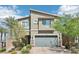 Charming two-story home with landscaped yard, stone accents, and a two car garage at 9238 Bluemist Falls St, Las Vegas, NV 89123