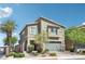 Charming two-story home with landscaped front yard and a two car garage at 9238 Bluemist Falls St, Las Vegas, NV 89123