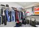 Well-organized walk-in closet with ample hanging and storage space at 9238 Bluemist Falls St, Las Vegas, NV 89123