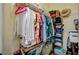 Walk-in closet featuring wire shelving, ample storage, and organized clothing at 9303 Gilcrease Ave # 2234, Las Vegas, NV 89149