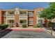 Attractive apartment building featuring a two-tone exterior with well-maintained landscaping at 9303 Gilcrease Ave # 2234, Las Vegas, NV 89149