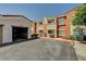 Charming two-story building with a spacious parking area, inviting exterior, and visible unit numbers at 9303 Gilcrease Ave # 2234, Las Vegas, NV 89149