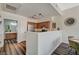 Open concept kitchen with oak cabinetry, stainless appliances, and breakfast bar area to the dining nook at 9303 Gilcrease Ave # 2234, Las Vegas, NV 89149