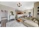 Comfortable living room with a view of the kitchen and dining area at 9303 Gilcrease Ave # 2234, Las Vegas, NV 89149