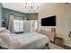 Bright main bedroom featuring a ceiling fan, large windows, and neutral tones at 9303 Gilcrease Ave # 2234, Las Vegas, NV 89149