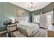 Inviting main bedroom with a large window, stylish decor, and a comfortable bed at 9303 Gilcrease Ave # 2234, Las Vegas, NV 89149
