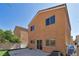 Backyard featuring a concrete patio and a fenced yard at 9443 Hot Breeze St, Las Vegas, NV 89178