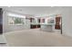 Open-concept kitchen and dining area with ample counter space, ideal for cooking and entertaining at 9742 Toad Hollow St, Las Vegas, NV 89141