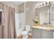 Bathroom featuring a shower-tub combo, neutral walls, and vanity with granite countertop at 9975 Peace Way # 2009, Las Vegas, NV 89147