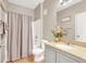 Bathroom featuring a shower and tub combination and a granite countertop sink at 9975 Peace Way # 2009, Las Vegas, NV 89147
