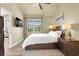 Bright bedroom with modern decor, a window, and convenient access to an adjacent living space at 9975 Peace Way # 2009, Las Vegas, NV 89147