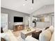 Inviting living room with vaulted ceiling, modern decor, and seamless access to the kitchen area at 9975 Peace Way # 2009, Las Vegas, NV 89147