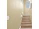 Staircase featuring neutral walls and light wood treads leading to the upper level at 9975 Peace Way # 2009, Las Vegas, NV 89147