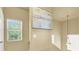 Open upstairs area with natural light, neutral paint, and decorative artwork at 9975 Peace Way # 2009, Las Vegas, NV 89147