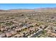 Aerial neighborhood view of rows of houses surrounded by desert landscaping and mountain views at 12269 Catanzaro Ave, Las Vegas, NV 89138
