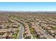 The sweeping neighborhood aerial showcases a meticulously planned residential community with backyard pools and lush landscaping features at 12269 Catanzaro Ave, Las Vegas, NV 89138