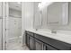 Bathroom featuring tile floors, double sinks and a shower at 12269 Catanzaro Ave, Las Vegas, NV 89138