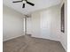 Neutral toned bedroom with fan, carpet and shuttered window at 12269 Catanzaro Ave, Las Vegas, NV 89138