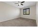 Bedroom featuring carpet floors, neutral walls, and a ceiling fan with a light at 12269 Catanzaro Ave, Las Vegas, NV 89138