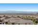 Expansive city view surrounded by mountains, desert landscaping, and blue skies at 12269 Catanzaro Ave, Las Vegas, NV 89138