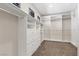 Walk-in closet featuring built-in shelving and drawers at 12269 Catanzaro Ave, Las Vegas, NV 89138