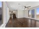 Living room boasting hardwood floors, a ceiling fan, and access to the second floor at 12269 Catanzaro Ave, Las Vegas, NV 89138