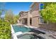 View of the pool and outdoor space, part of this home's elegant backyard at 12269 Catanzaro Ave, Las Vegas, NV 89138