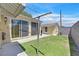 A spacious backyard with a clothesline and detached structure for additional storage at 1331 Melville Dr, Las Vegas, NV 89102