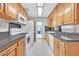 Functional kitchen with wood cabinets, stainless steel appliances, and ample counter space at 1331 Melville Dr, Las Vegas, NV 89102