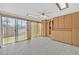 A bright tiled room has a sliding glass door and ample storage at 1331 Melville Dr, Las Vegas, NV 89102