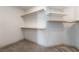Walk-in closet with custom shelving and ample storage space for organization, adding functionality and value at 1403 Graystone Canyon Ave, Las Vegas, NV 89183